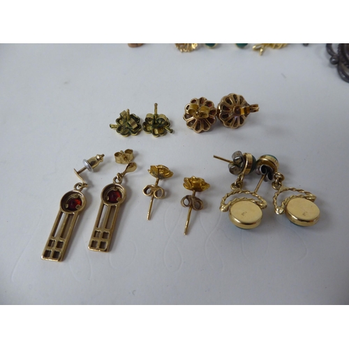 71 - Yellow metal and items of personal ornament: to include variously set earrings; and brooches