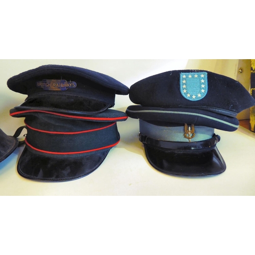 130 - Four various military and related peaked caps, a beret and a painted steel helmet(Please Note: this ... 