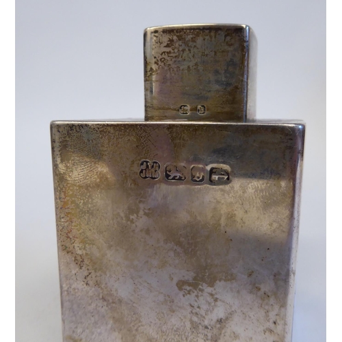 134 - A late Victorian silver tea caddy of shouldered, diamond shape with a cap  Hukin & Heath  Birmin... 