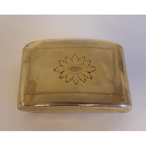 136 - A Georgian silver gilt, cushion moulded snuff box with uniformly, scratch engraved ornament and a fl... 