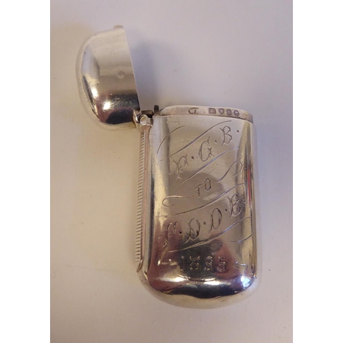 137 - A silver cushion moulded hip flask with a rotating, hinged cap; and a lozenge shape vesta case with ... 