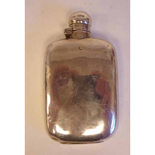 137 - A silver cushion moulded hip flask with a rotating, hinged cap; and a lozenge shape vesta case with ... 