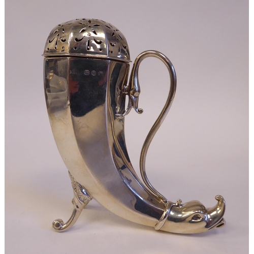 144 - A late Victorian silver horn shape caster with a dolphin's head terminal, scrolled wire handle and d... 