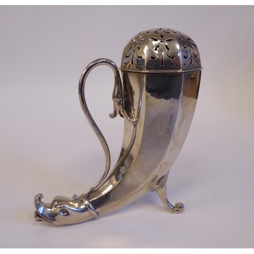 144 - A late Victorian silver horn shape caster with a dolphin's head terminal, scrolled wire handle and d... 