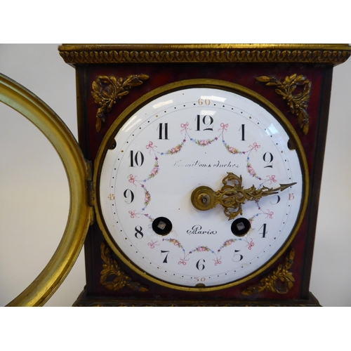 159 - A late 19thC/early 20thC Parisian tortoiseshell and brass cased mantel clock with a pagoda top and a... 