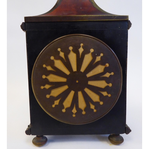 159 - A late 19thC/early 20thC Parisian tortoiseshell and brass cased mantel clock with a pagoda top and a... 