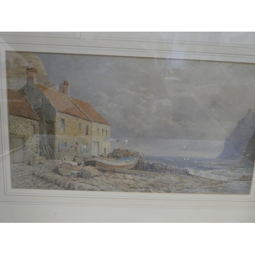 215 - W* - a fisherman's cottage with vessels on a foreshore  watercolour  bears an indistinct s... 