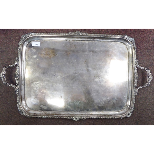 236 - A late Victorian silver, twin handled serving tray with gadrooned, shell and foliate cast borders&nb... 