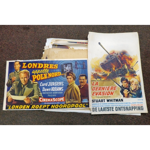 237 - A selection of French language, coloured film posters, many featuring Second World War period produc... 