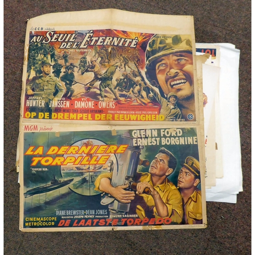 237 - A selection of French language, coloured film posters, many featuring Second World War period produc... 