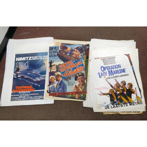 237 - A selection of French language, coloured film posters, many featuring Second World War period produc... 