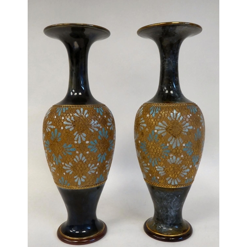 239 - A pair of early 20thC Royal Doulton stoneware, ovoid shape vases with narrow necks and flared rims, ... 