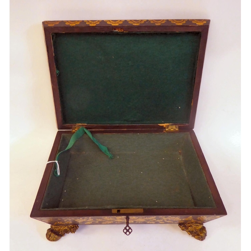 254 - A 19thC playing card box with a hinged lid, decorated with oak leaves and a part deck of cards, on g... 