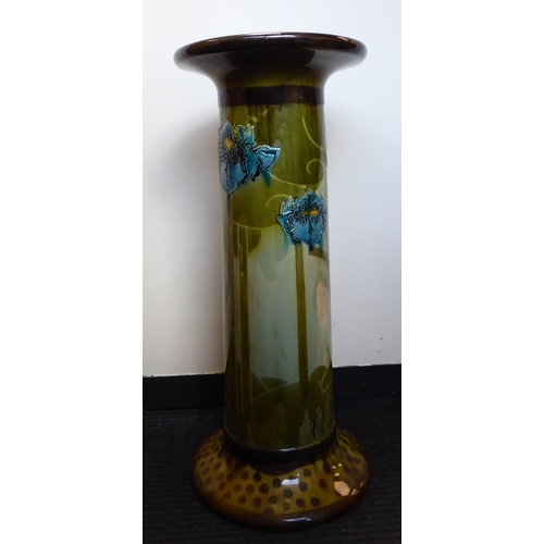 258 - A late Victorian ceramic pedestal, decorated in colours and part tubeline with stylised flora  ... 