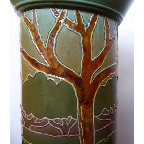 259 - A late Victorian ceramic pedestal, decorated in colours and tubeline with stylised trees  26