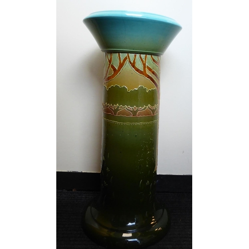 259 - A late Victorian ceramic pedestal, decorated in colours and tubeline with stylised trees  26