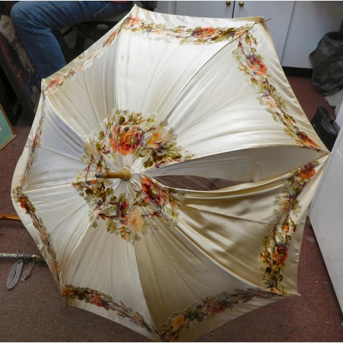 277 - Five Edwardian and later parasols, viz. one S.Cox & Sons with a silvered metal handle and tassel... 