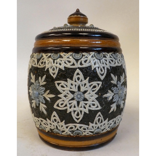 28 - A Doulton Lambeth stoneware tobacco jar and cover, decorated in blue, brown and cream in Slaters Pat... 