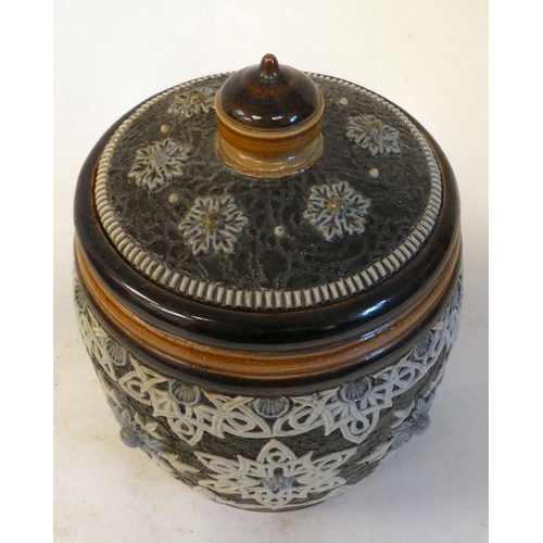 28 - A Doulton Lambeth stoneware tobacco jar and cover, decorated in blue, brown and cream in Slaters Pat... 