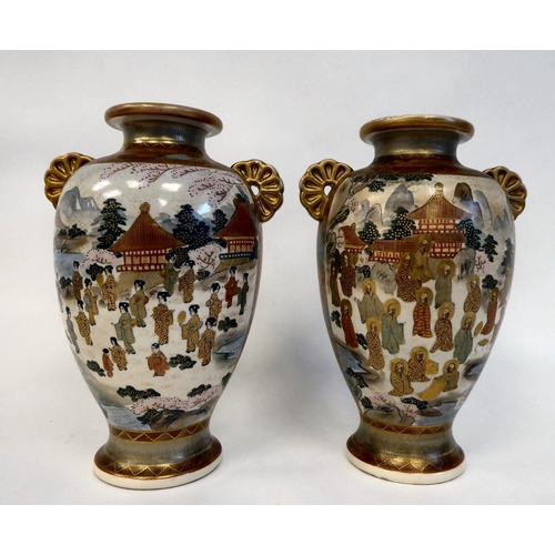 281 - A pair of late 19thC Imari porcelain, twin handled, baluster shape vases, decorated in colours and g... 