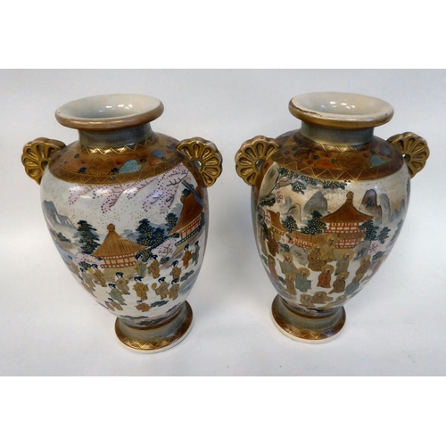 281 - A pair of late 19thC Imari porcelain, twin handled, baluster shape vases, decorated in colours and g... 