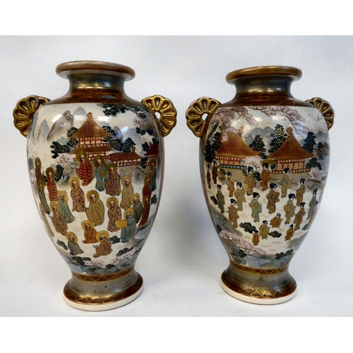 281 - A pair of late 19thC Imari porcelain, twin handled, baluster shape vases, decorated in colours and g... 