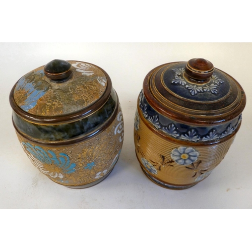 29 - Two Royal Doulton stoneware tobacco jars with covers, one decorated in Slaters Patent with painted a... 