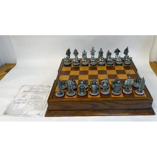 293 - A Danbury Mint 'The Armada Chess Set' (No.2144) crafted in pewter, in an oak box and board with a ce... 