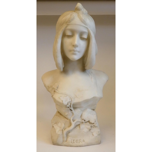 3 - An Art Nouveau carved white marble bust, a maiden with her hair tied back and ornamented with traili... 