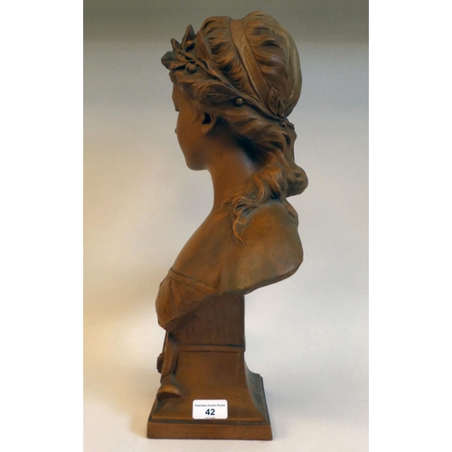 42 - An Art Nouveau terracotta bust, a young girl with fruiting vine in her hair, on a socle, incorporati... 