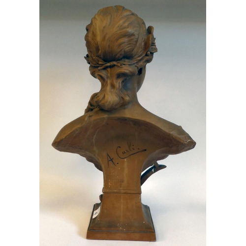 42 - An Art Nouveau terracotta bust, a young girl with fruiting vine in her hair, on a socle, incorporati... 