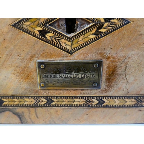 52 - A late Victorian figured walnut, feather and mother-of-pearl inlaid writing box, the angled, hinged ... 