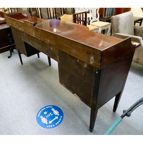 54 - A Regency Irish satinwood inlaid, mahogany breakfront sideboard with three inline drawers, above a c... 