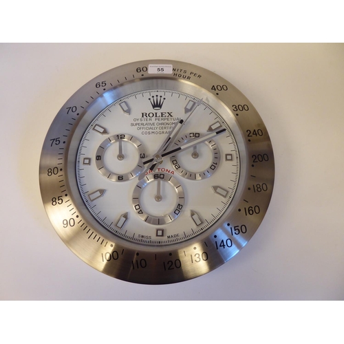 55 - A dealer display advertising wall timepiece for 'Rolex Oyster Perpetual'; the movement with three su... 