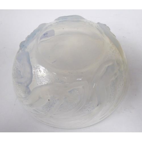 59 - A Lalique opalescent Ondines crystal bowl  bears a moulded mark  8.25