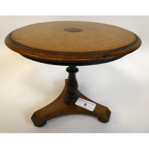 6 - A 19thC miniature mahogany centre table, in the manner of an apprentice piece, the tip-top over a ba... 