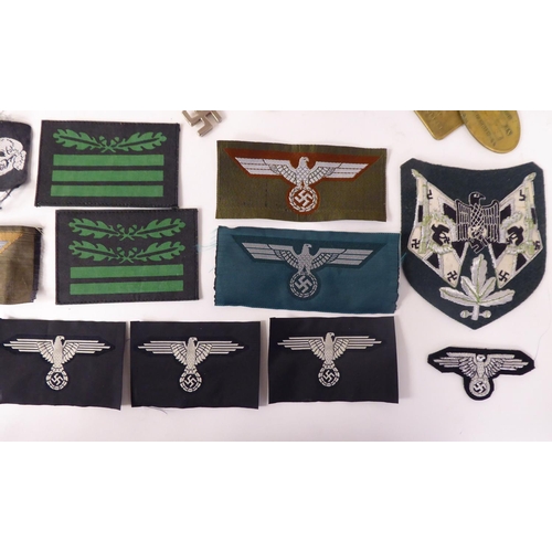 68 - German Third Reich badges, identification tags and uniform accessories, some copies: to include epau... 