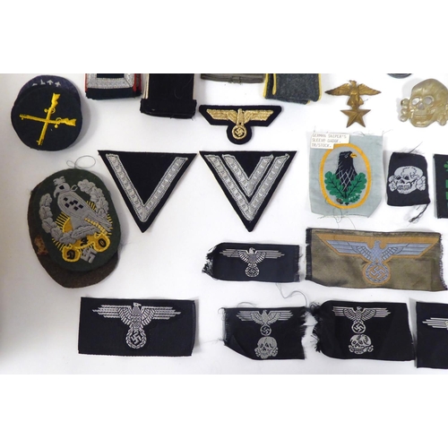 68 - German Third Reich badges, identification tags and uniform accessories, some copies: to include epau... 