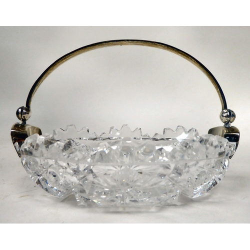 74 - A Russian silver mounted crystal dish of oval form, profusely cut with rosettes and other ornament, ... 