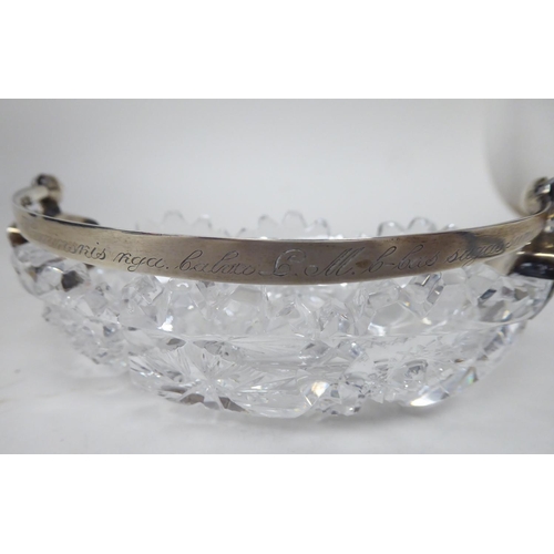 74 - A Russian silver mounted crystal dish of oval form, profusely cut with rosettes and other ornament, ... 