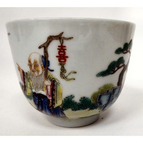 77 - A 19thC Chinese porcelain footed tea bowl, decorated in famille rose with a sage and a boy at play&n... 