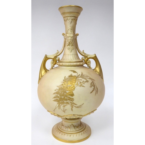 80 - A Royal Worcester blush ivory glazed and gilded china bottle vase of bulbous form with twin, scrolle... 