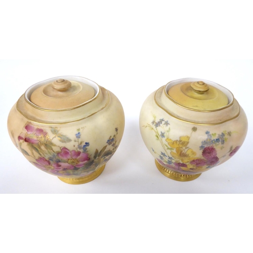 84 - A matched pair of Royal Worcester blush ivory glazed and gilded china jars of melon design, decorate... 