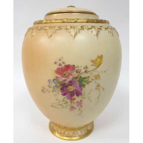 85 - A Royal Worcester blush ivory glazed and gilded china jar of baluster form, decorated with mixed flo... 