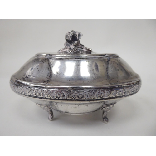 94 - A late 19thC Continental silver coloured metal jewellery box of oval bowl form with an outset, hinge... 