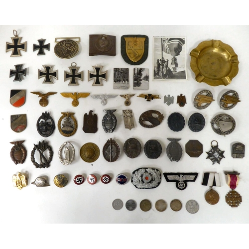 97 - German World War II/Third Reich related collectables, some copies: to include enamelled swastika bad... 