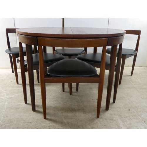 279 - A Frem Rajle of Denmark by Hans Olsen teak 'Roundette' dining table, raised on turned legs  29