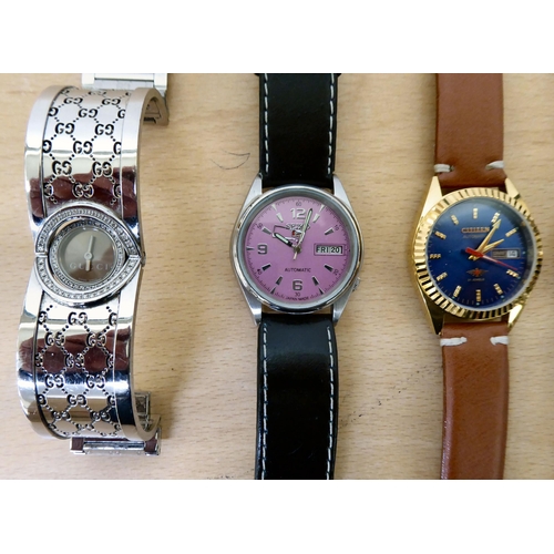 112 - Five wristwatches  variously cased and strapped: to include two Seiko