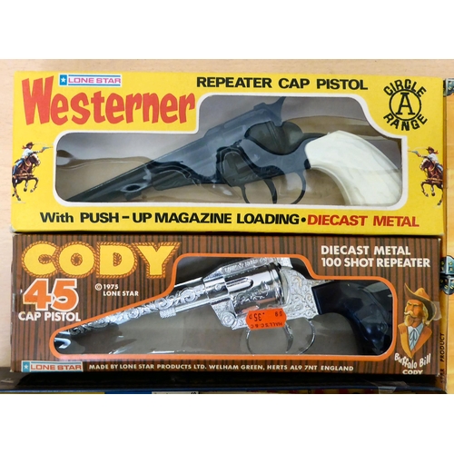 119 - Circa 1970s/80s cap pistols: to include a Lone Star 'Westener' with spare cap reels  boxed