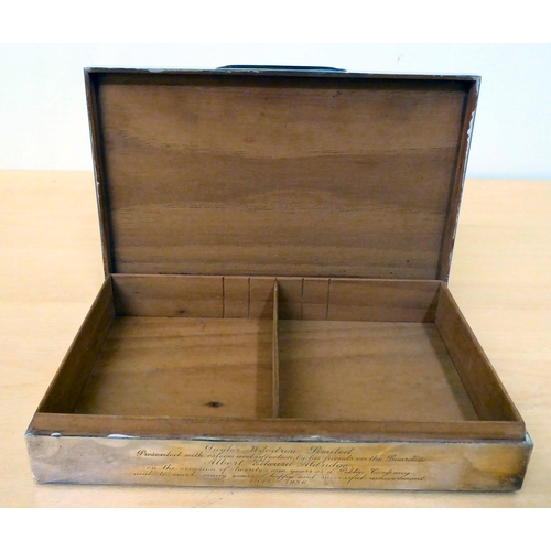 123 - A silver cigar box with an engine turned, hinged lid  indistinct London marks  10